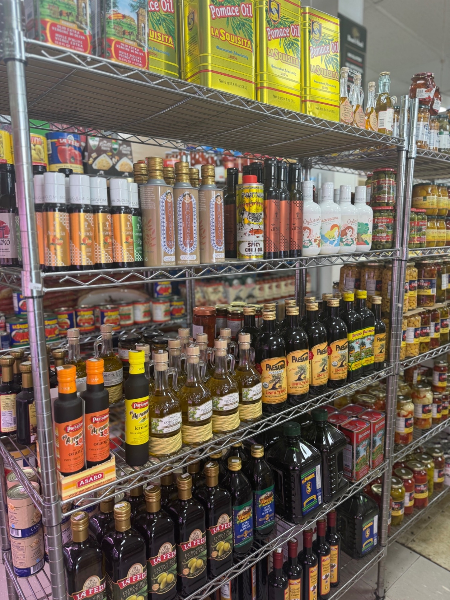 Shelves of imported Italian olive oil