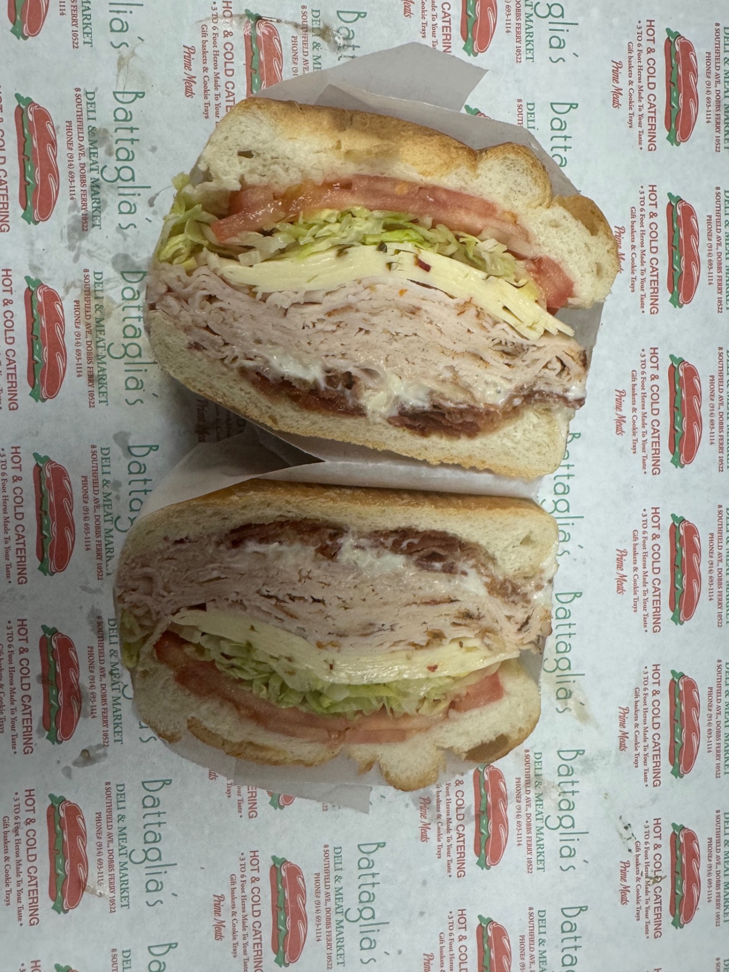 Roast turkey sub with fresh mozzarella, lettuce and tomato