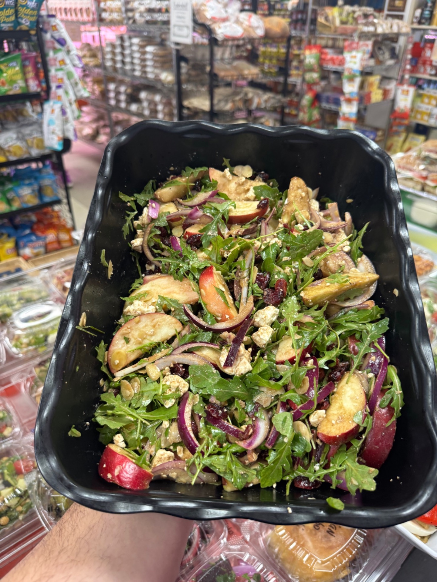 Arugula salad with apples, cranberries, red onion and feta